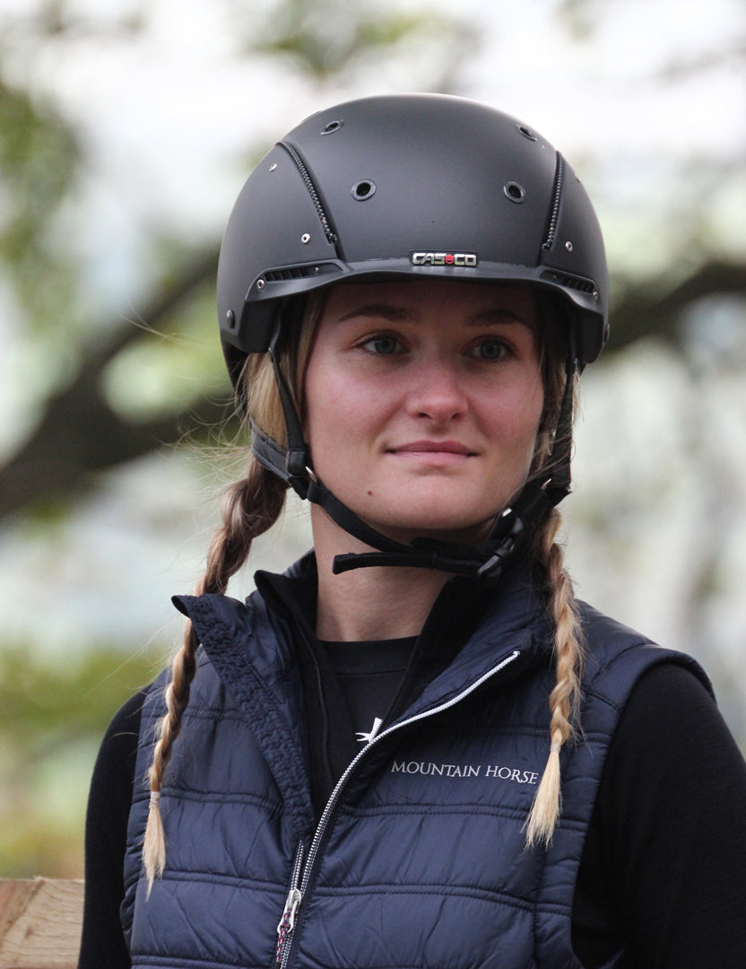 Rider poses in the Casco Champ 3 helmet in black